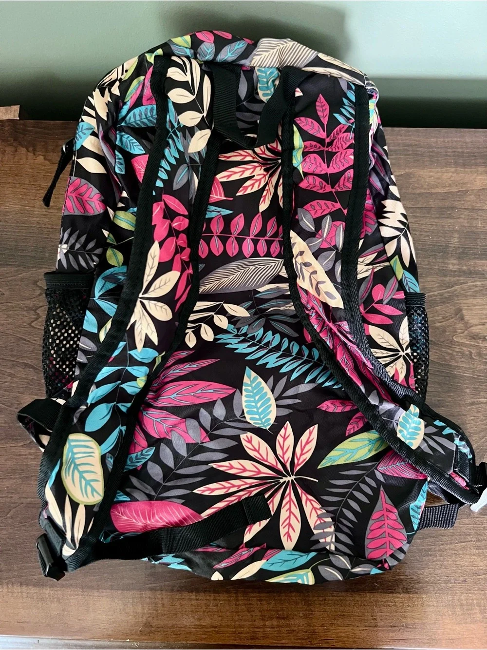 New- Never used. Floral Leaf Print lightweight packable Backpack - Black/Multi